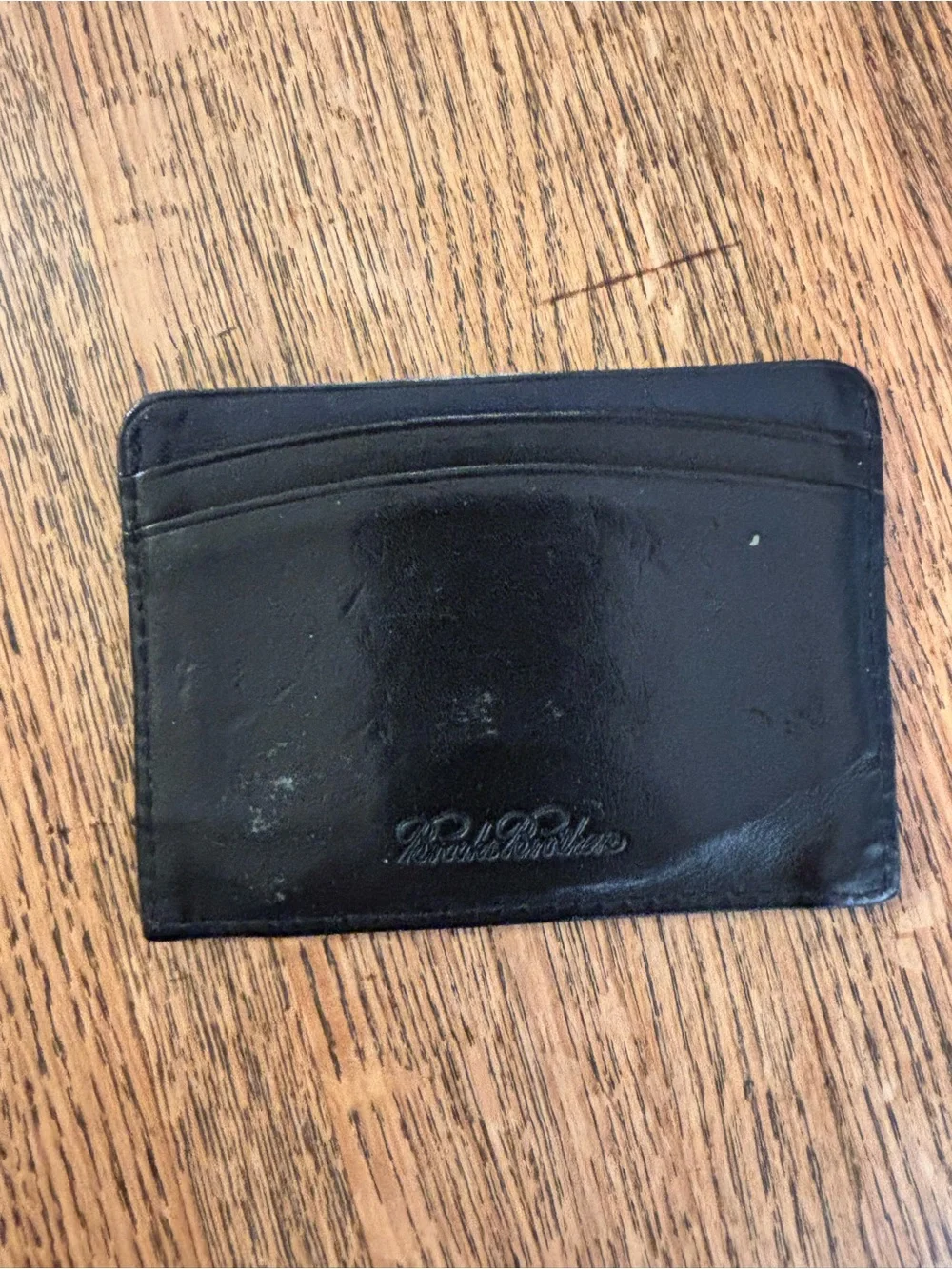 Four Vintage Black and Brown Leather Men's Wallets
